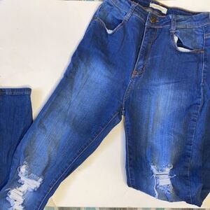 Machine distressed jeans  